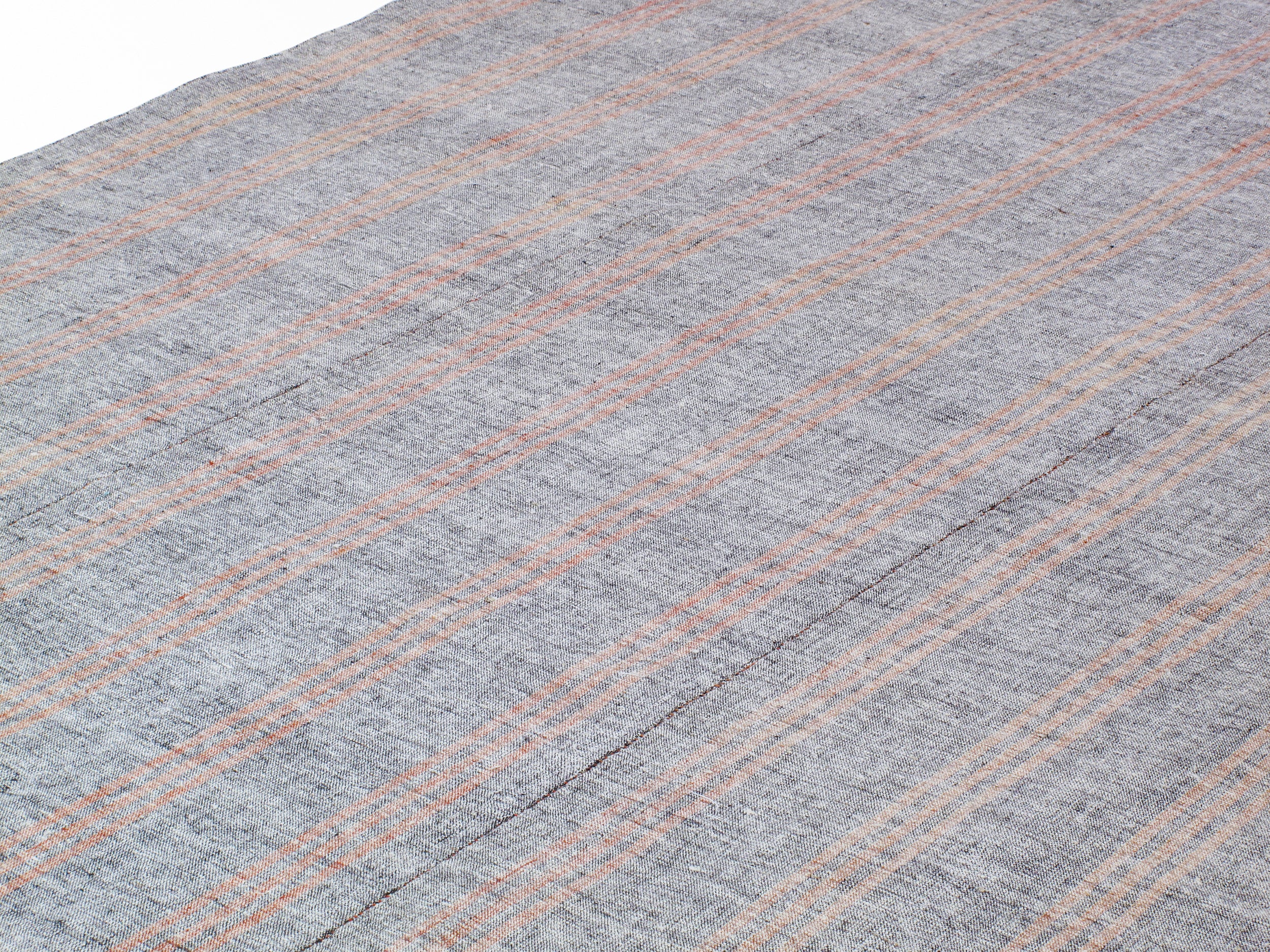 Gray Flatweave Rug with Red and Tan Vertical Stripes