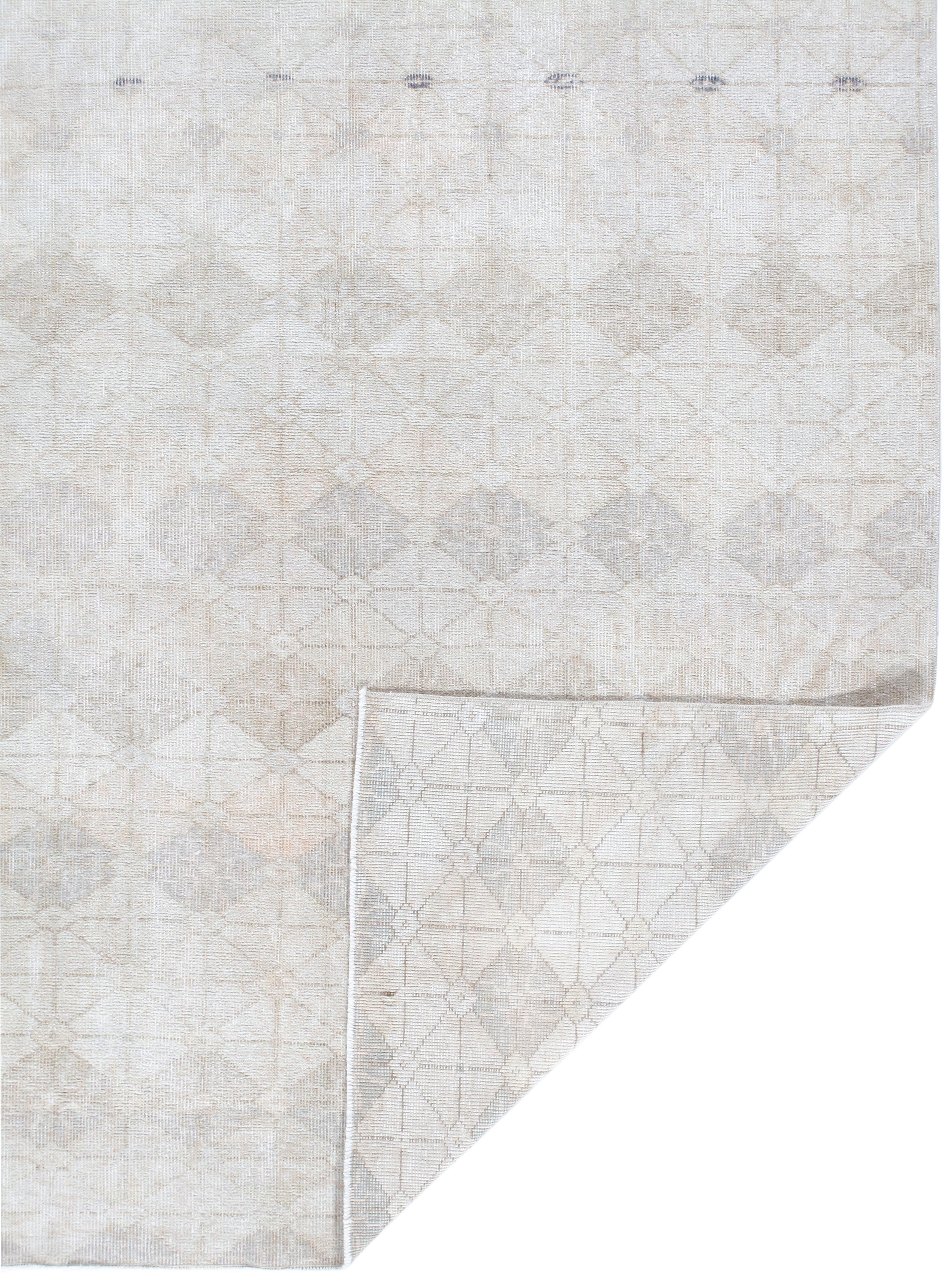 Faded Ivory Flatweave Rug with Subtle Tribal Motif