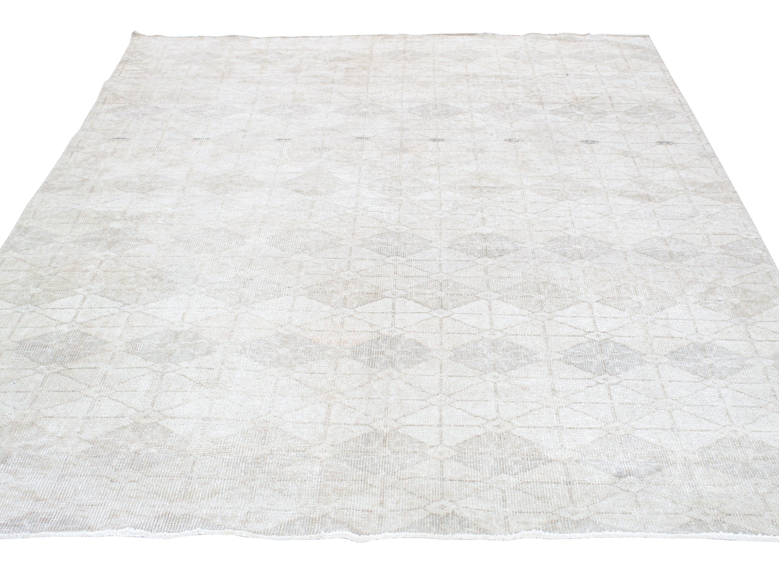 Faded Ivory Flatweave Rug with Subtle Tribal Motif