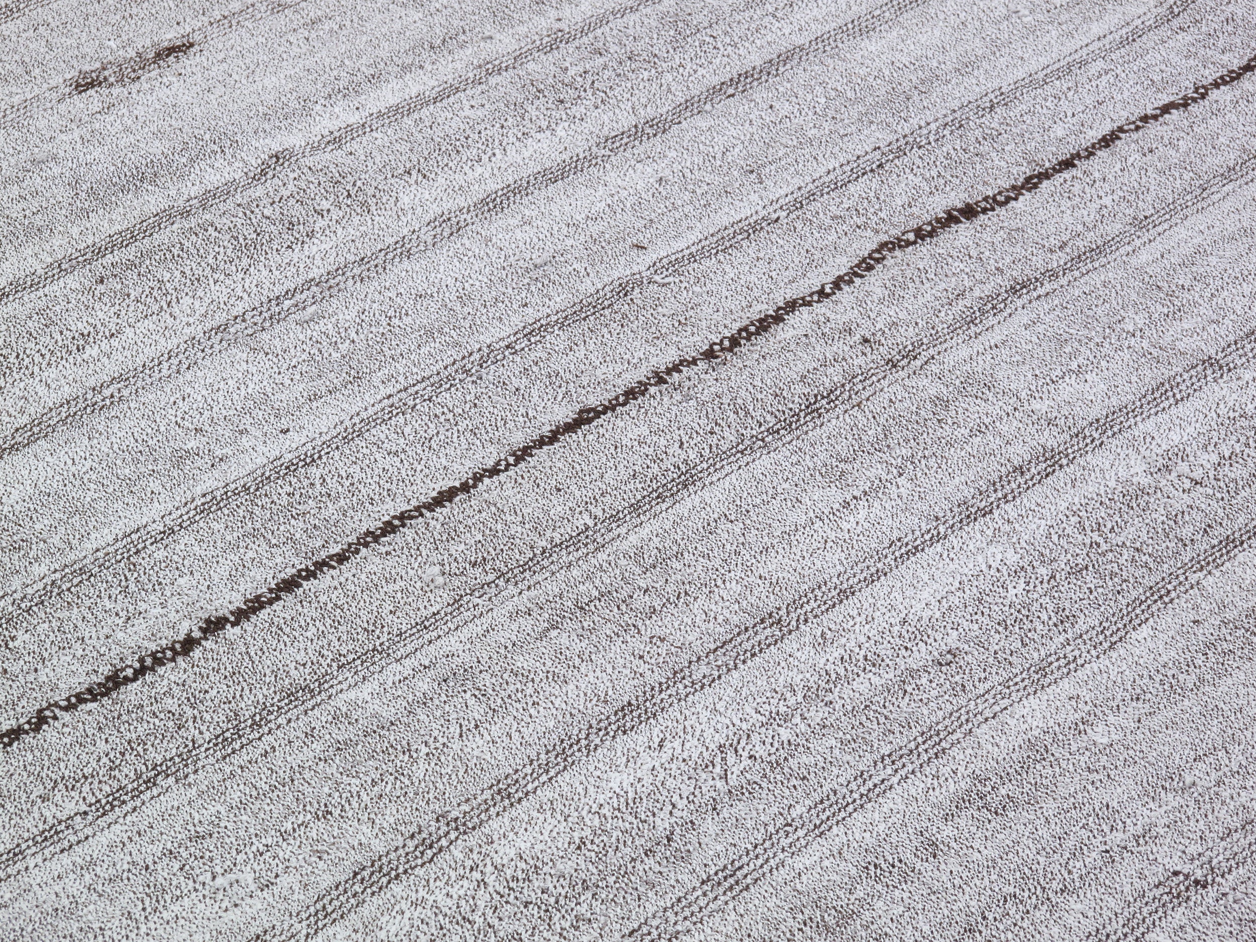Gray Flatweave Rug with Subtle Brown Vertical Stitch Lines