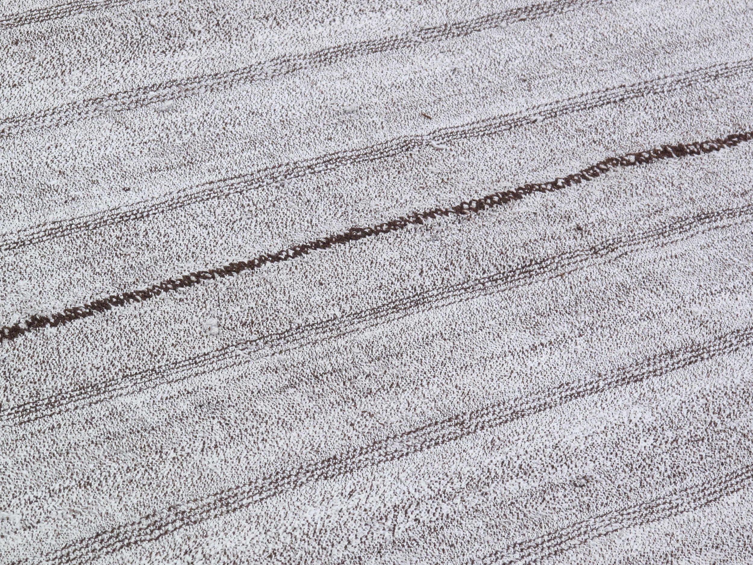 Gray Flatweave Rug with Subtle Brown Vertical Stitch Lines