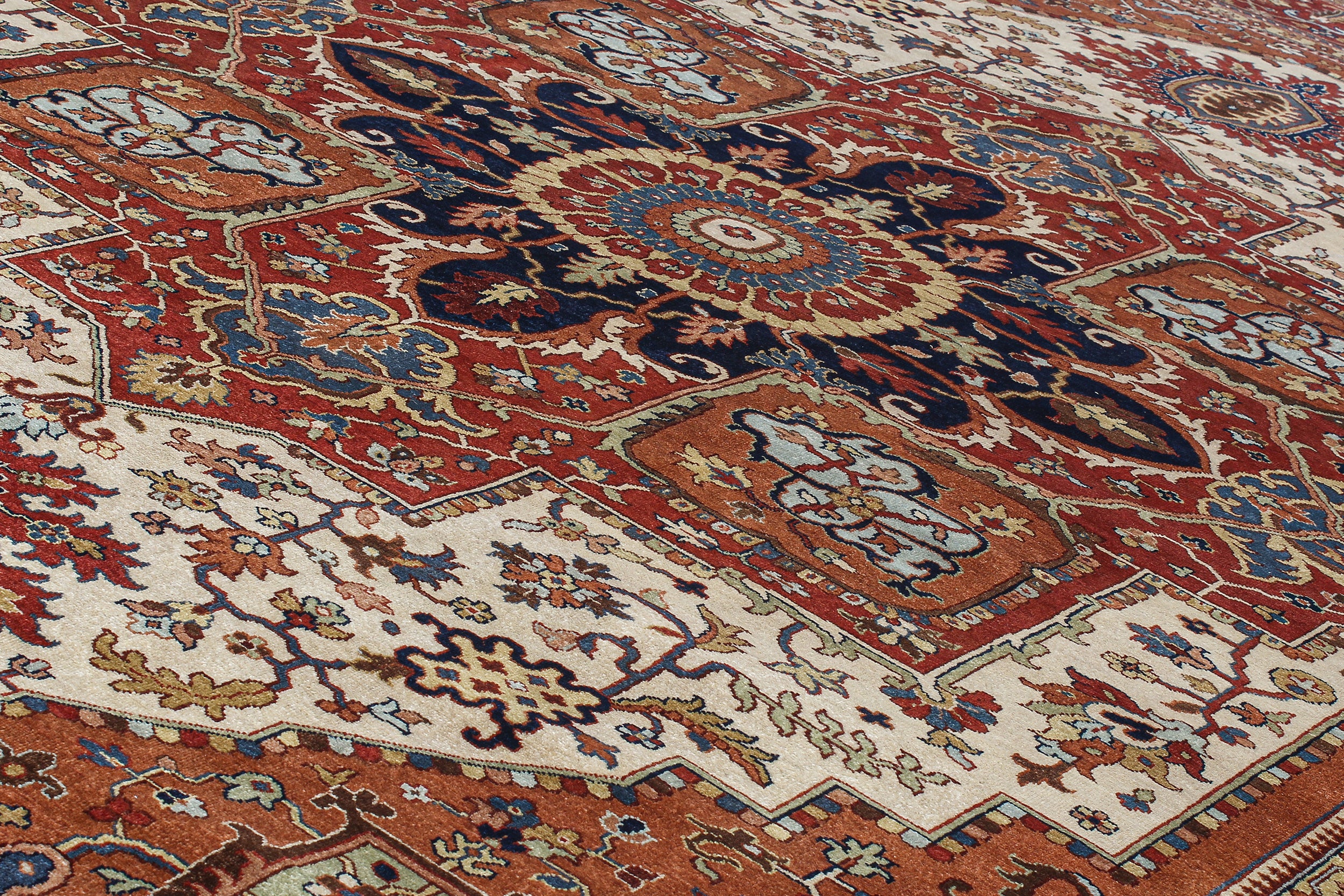 Vintage Persian Heriz Rug with Central Medallion in Rich Red, Ivory, and Indigo
