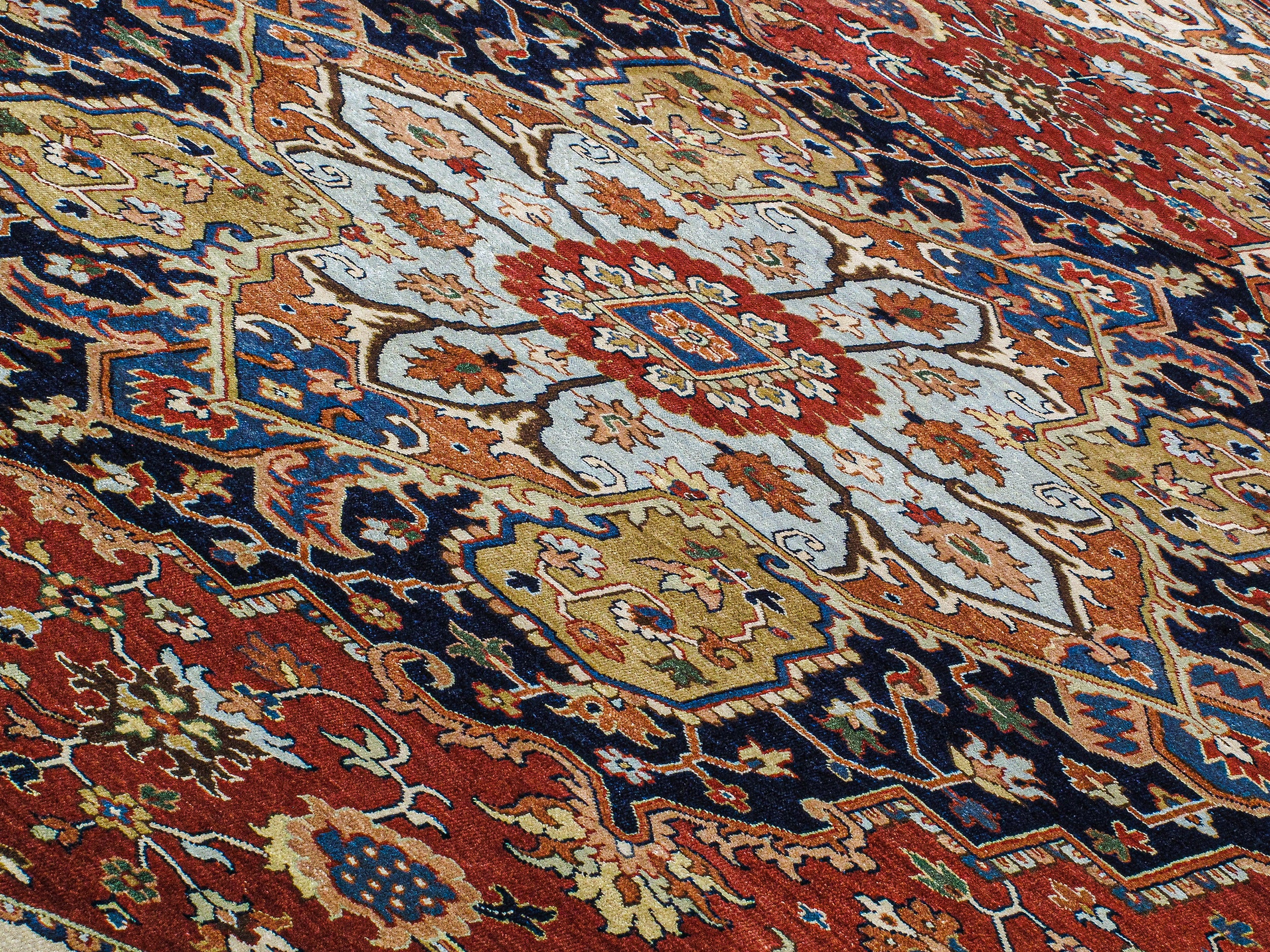 Persian Heriz-Style Rug with Central Medallion in Red, Navy, and Ivory