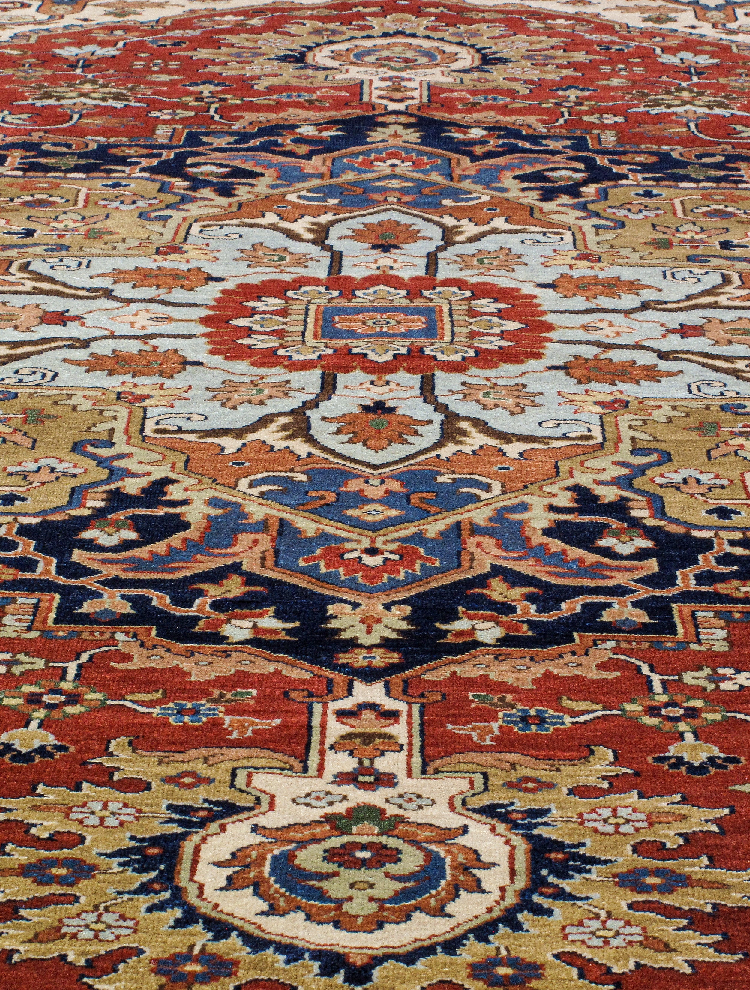 Persian Heriz-Style Rug with Central Medallion in Red, Navy, and Ivory
