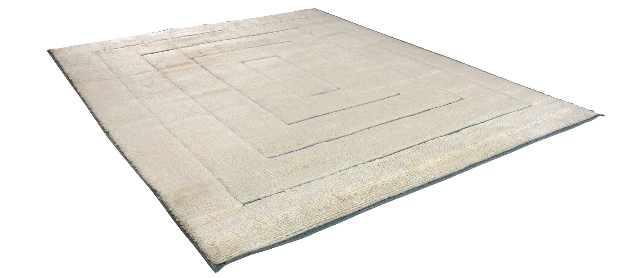 Ivory Minimalist Wool Rug with Sculpted Geometric Framing