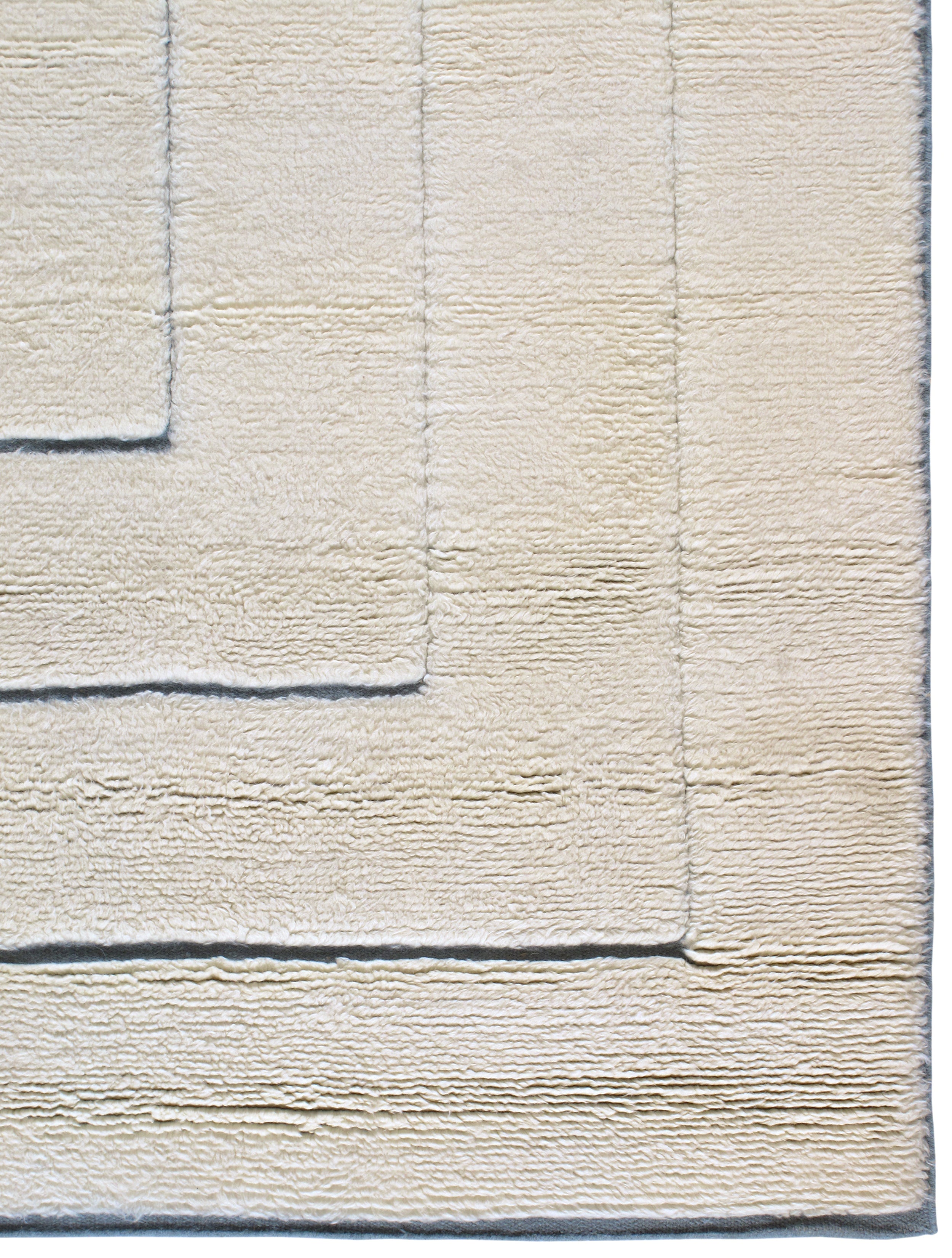 Ivory Minimalist Wool Rug with Sculpted Geometric Framing