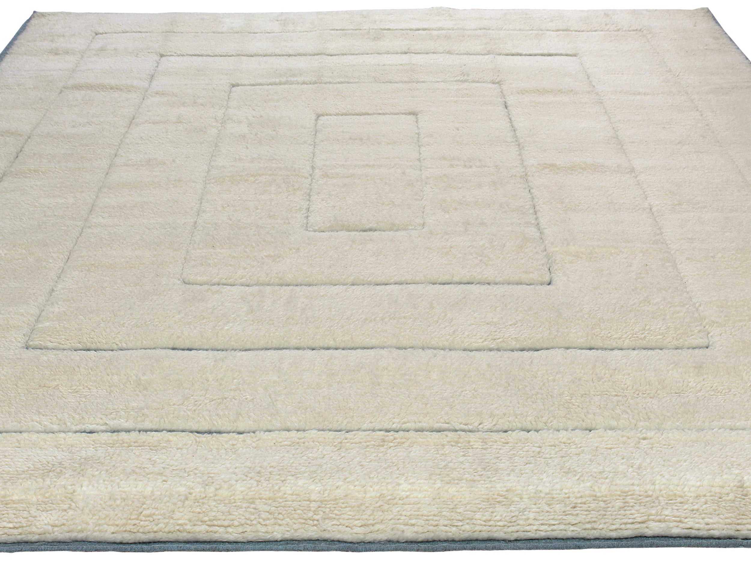 Ivory Minimalist Wool Rug with Sculpted Geometric Framing
