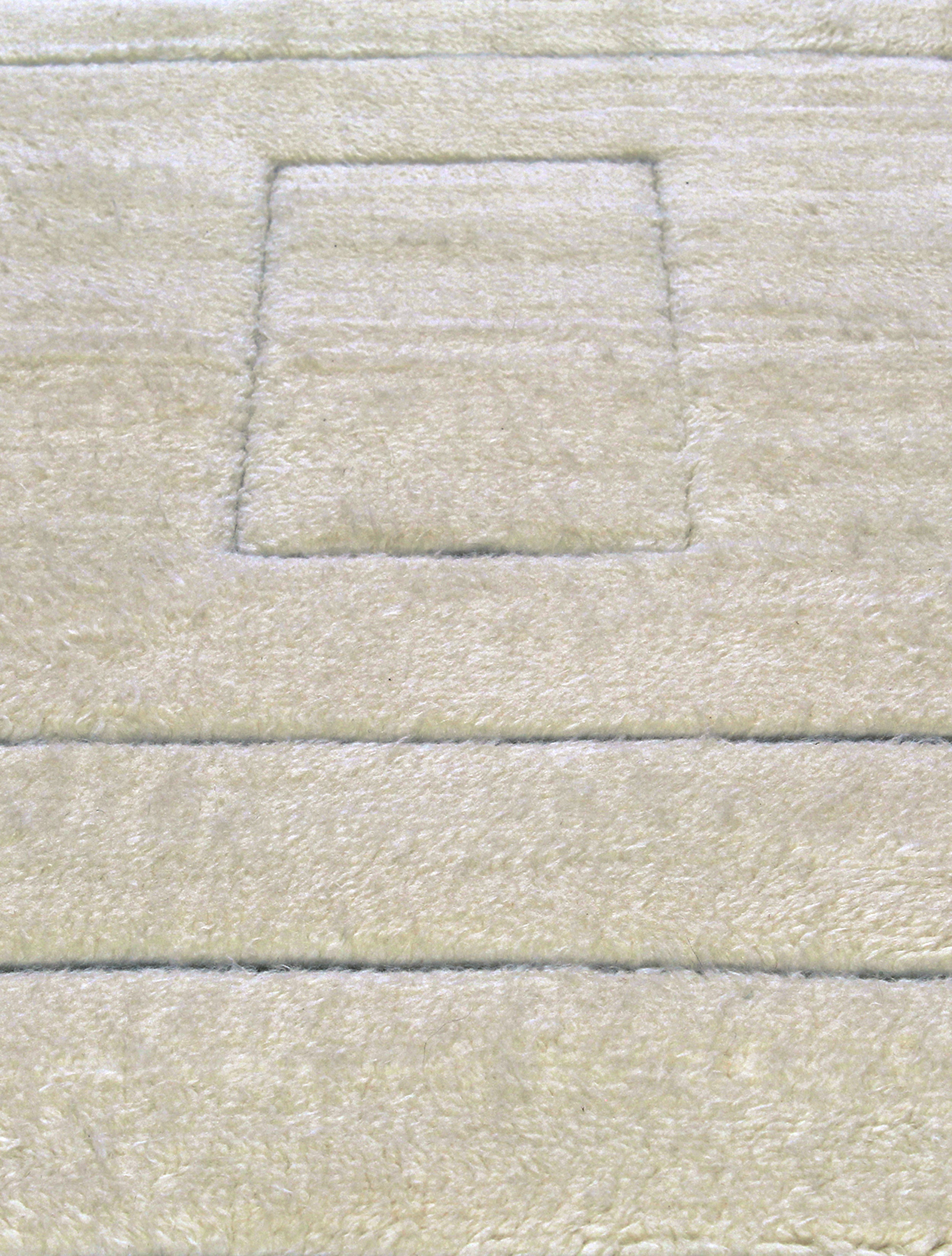 Ivory Minimalist Wool Rug with Sculpted Geometric Framing