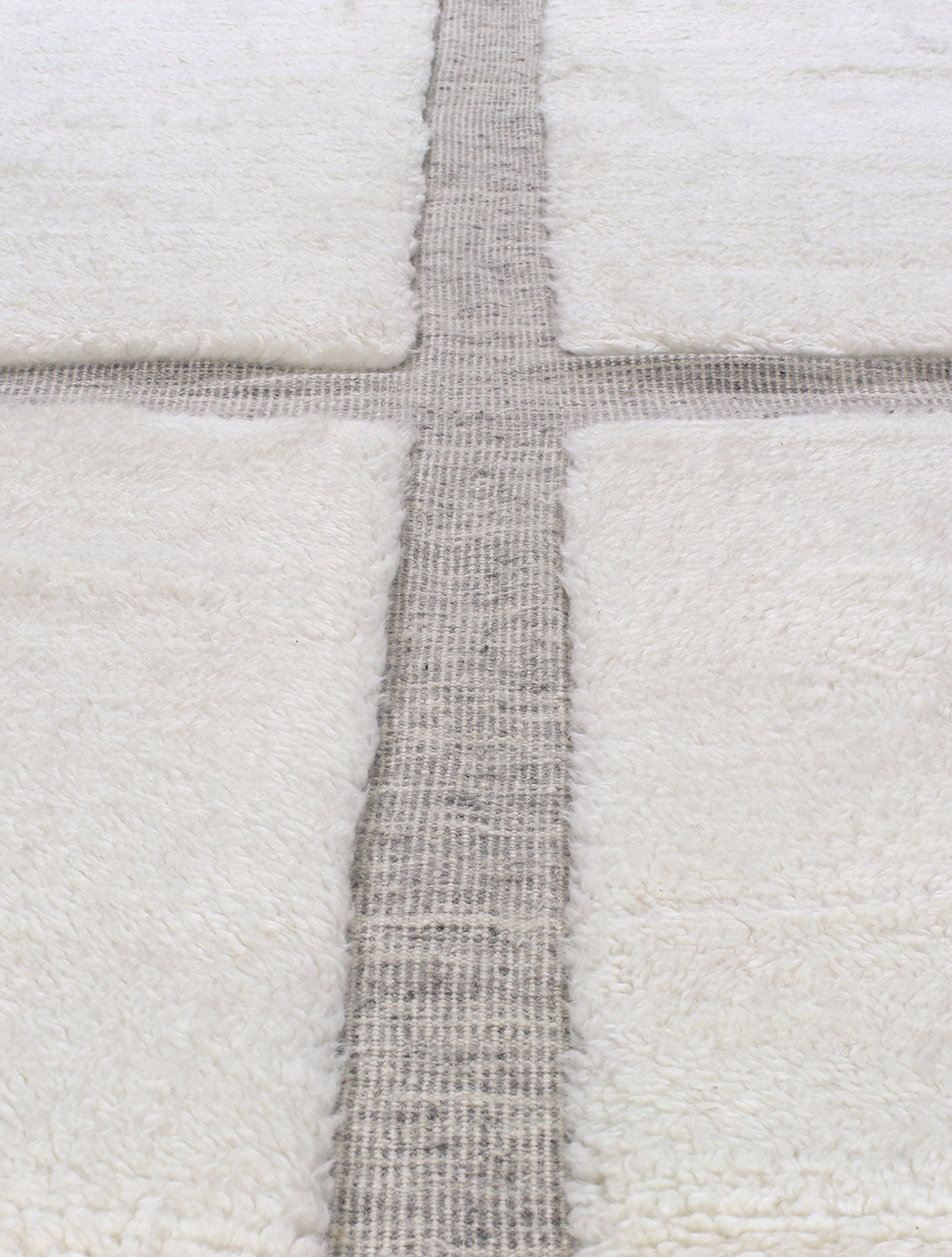 Textured Grid Wool Rug in Ivory and Taupe with Fringe Detail