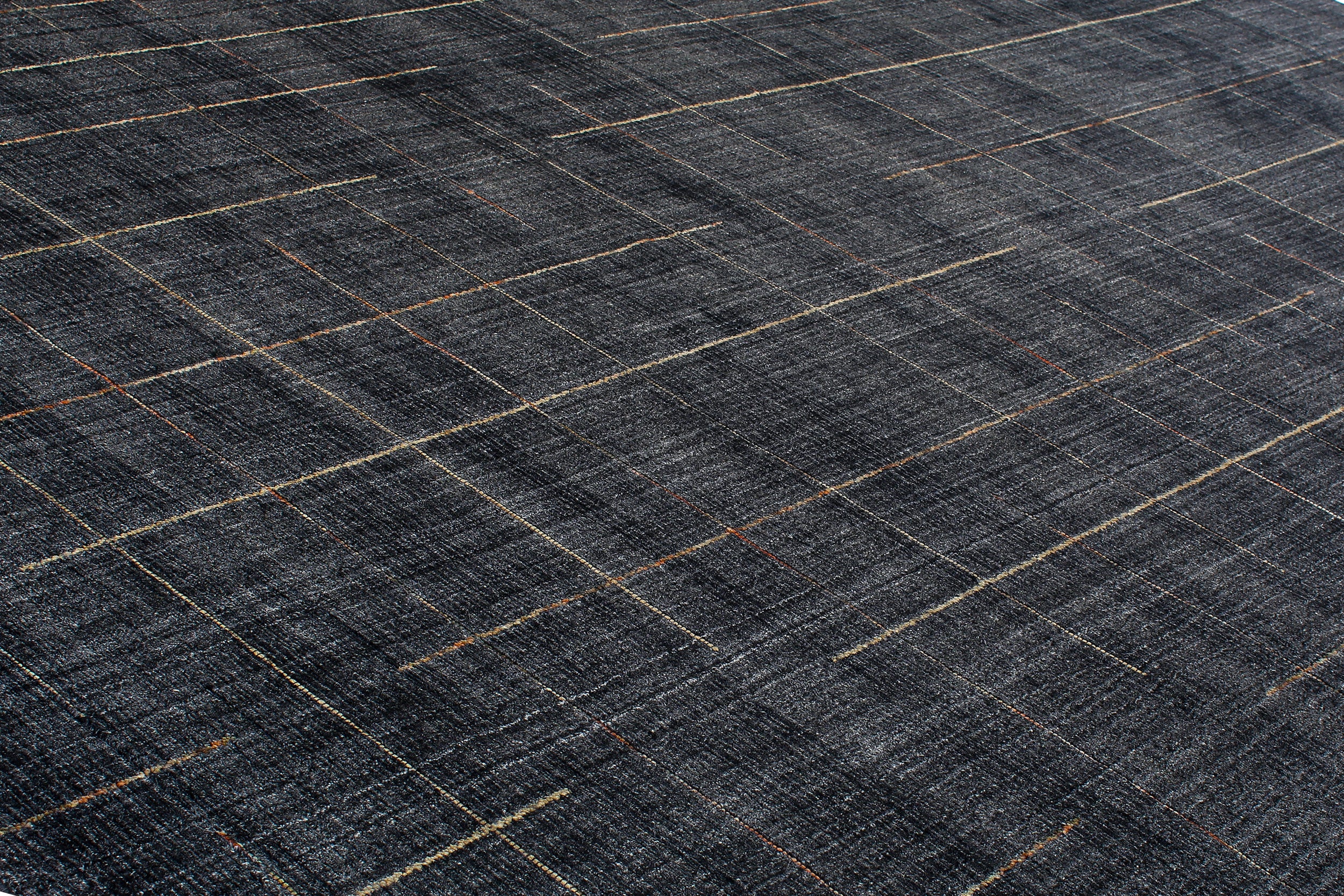 Charcoal Wool Rug with Linear Copper and Taupe Stitch Pattern