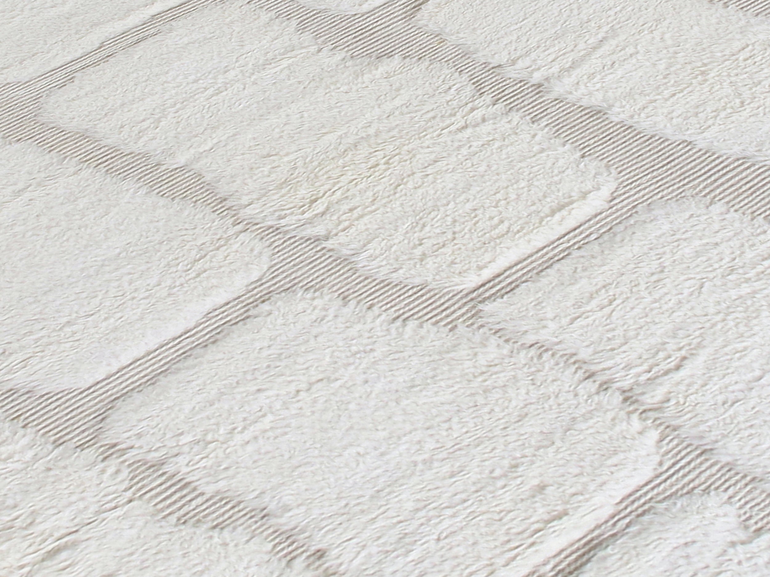 Modern Stone-Inspired Wool Rug in Ivory with Sculpted Texture and Fringe