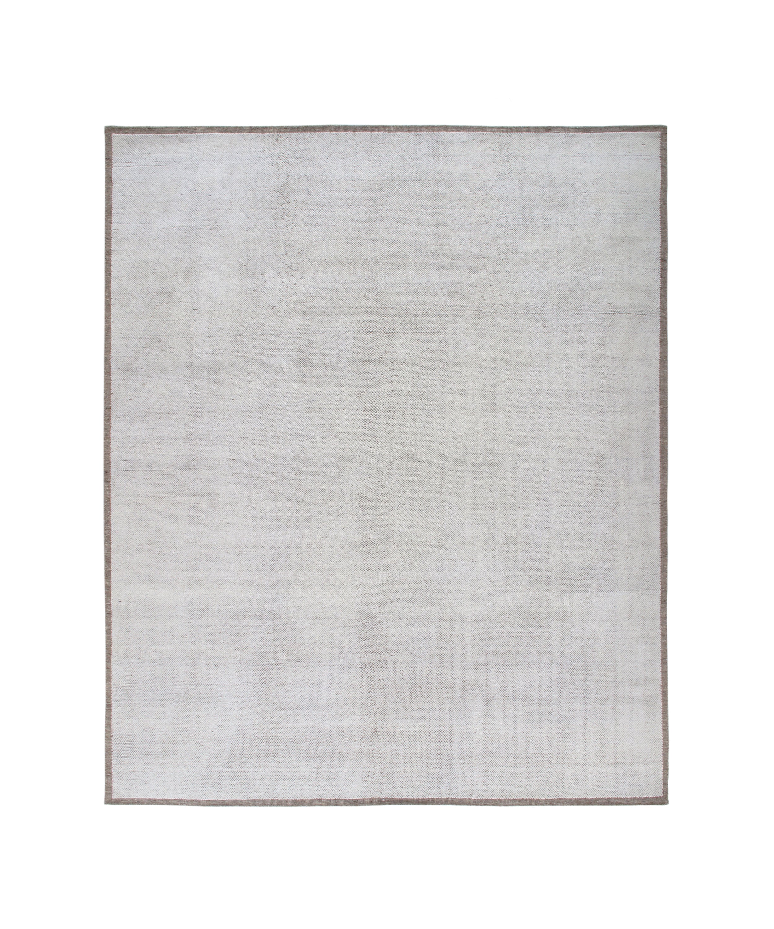 Handwoven Textured Rug in Soft Ivory and Clay Border