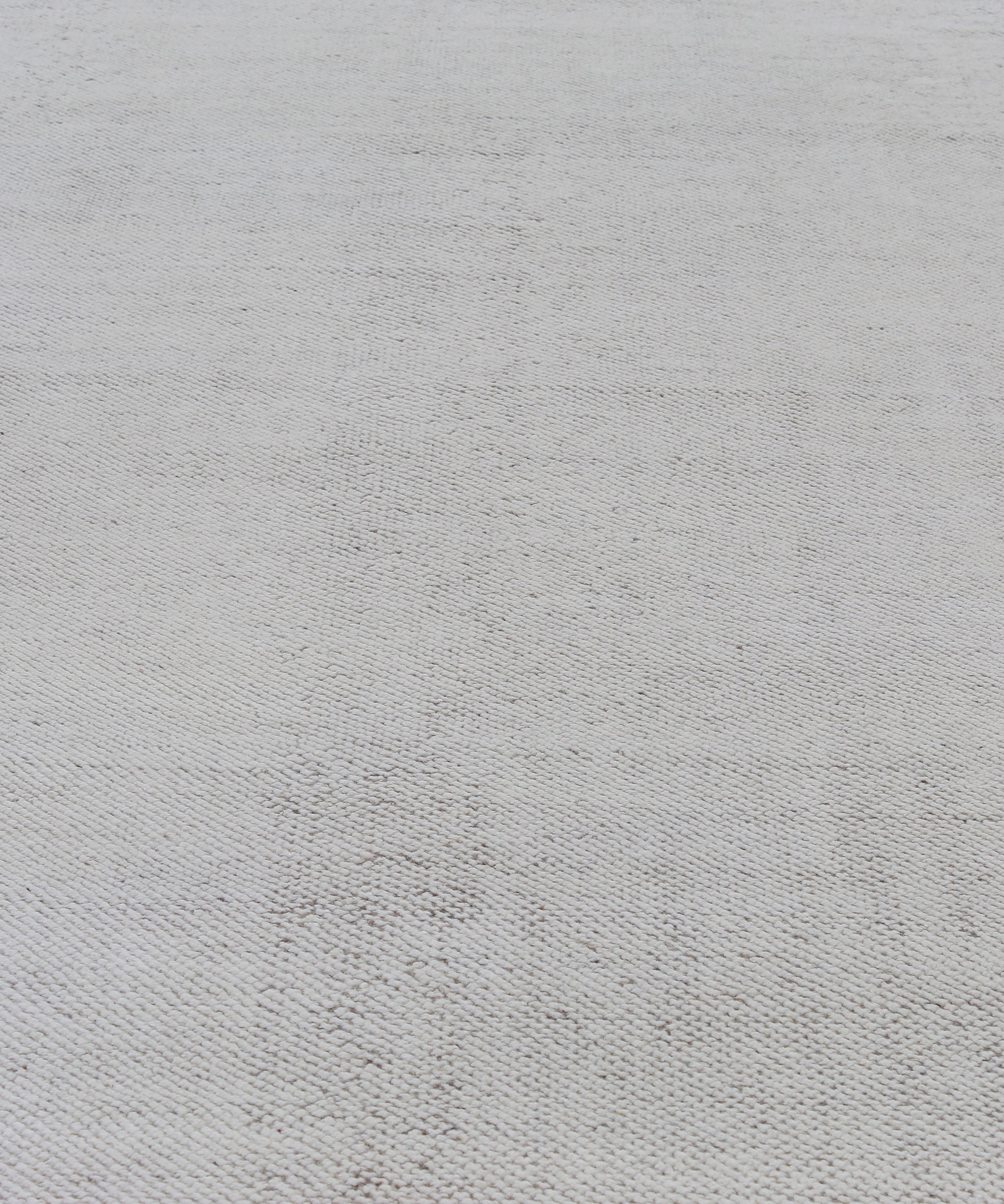 Handwoven Textured Rug in Soft Ivory and Clay Border