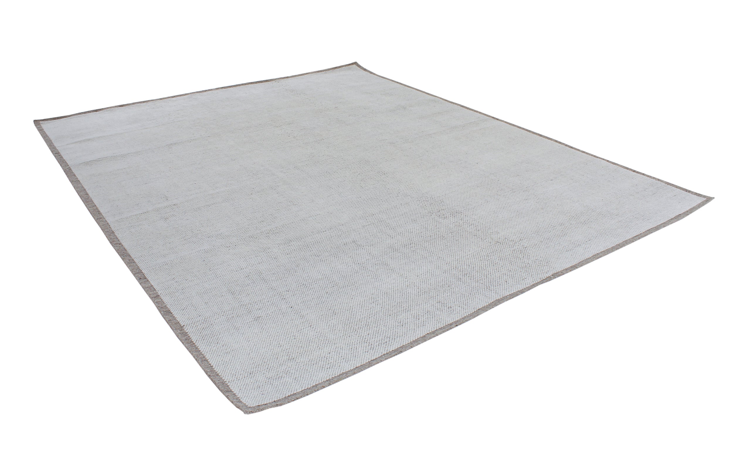 Handwoven Textured Rug in Soft Ivory and Clay Border