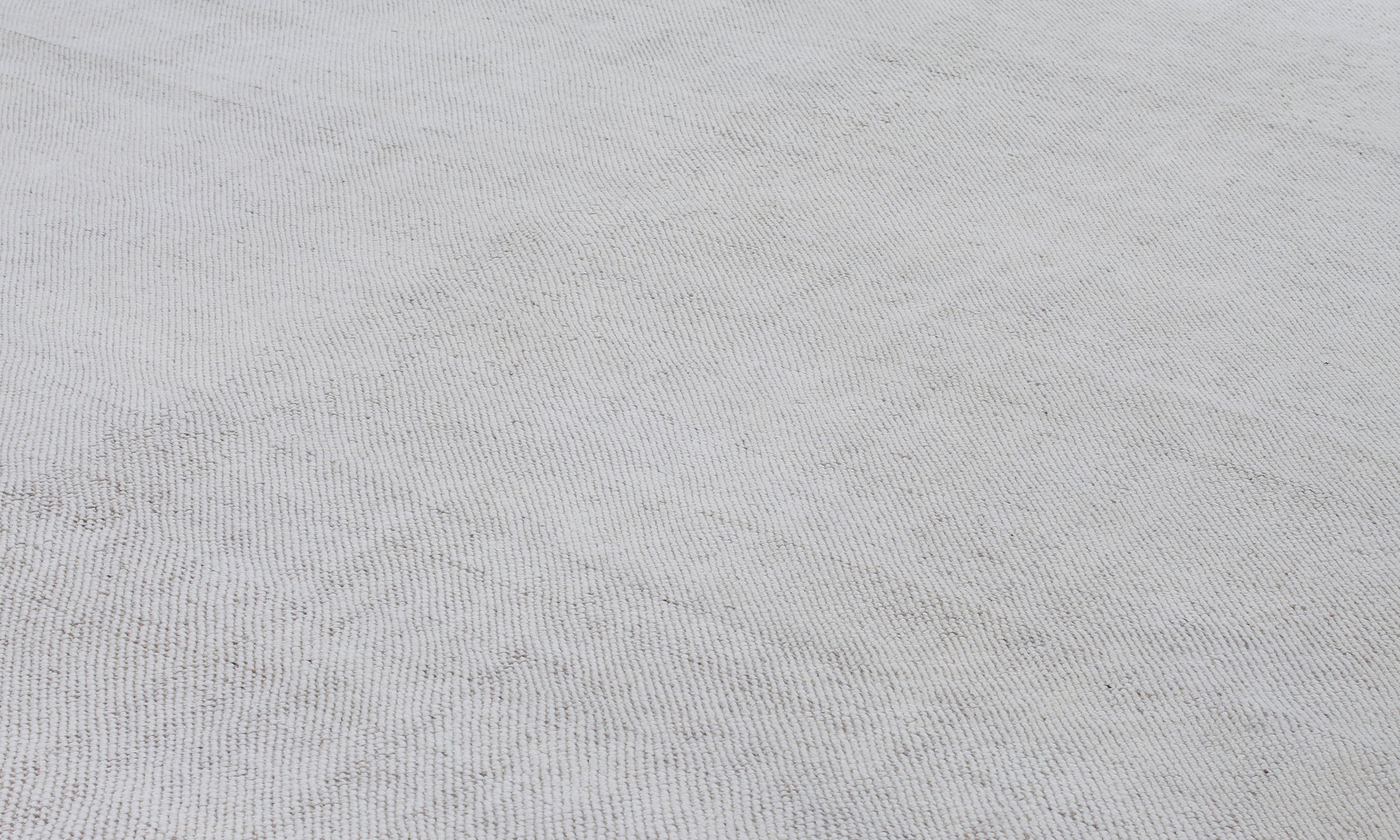 Handwoven Textured Rug in Soft Ivory and Clay Border