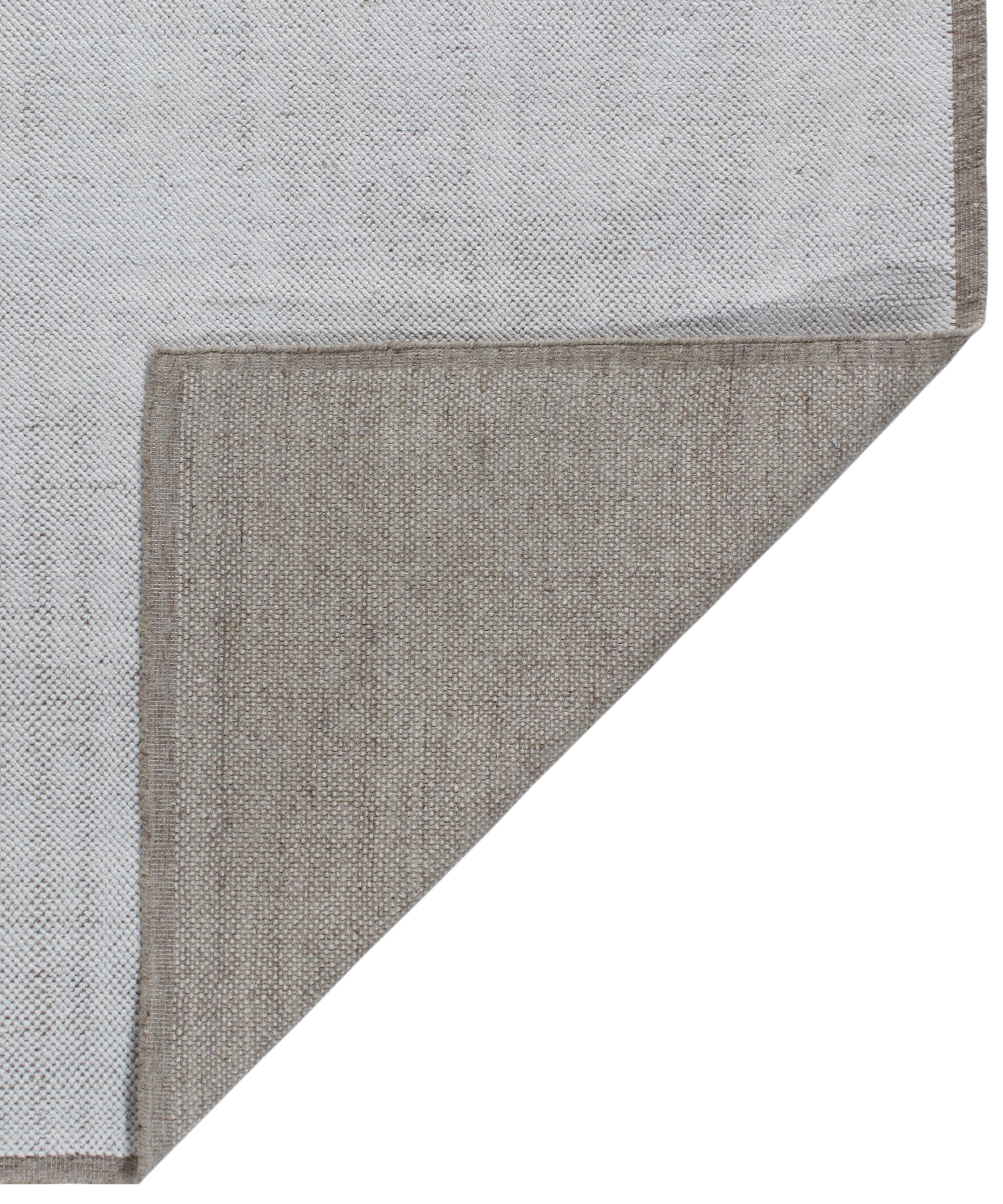Handwoven Textured Rug in Soft Ivory and Clay Border