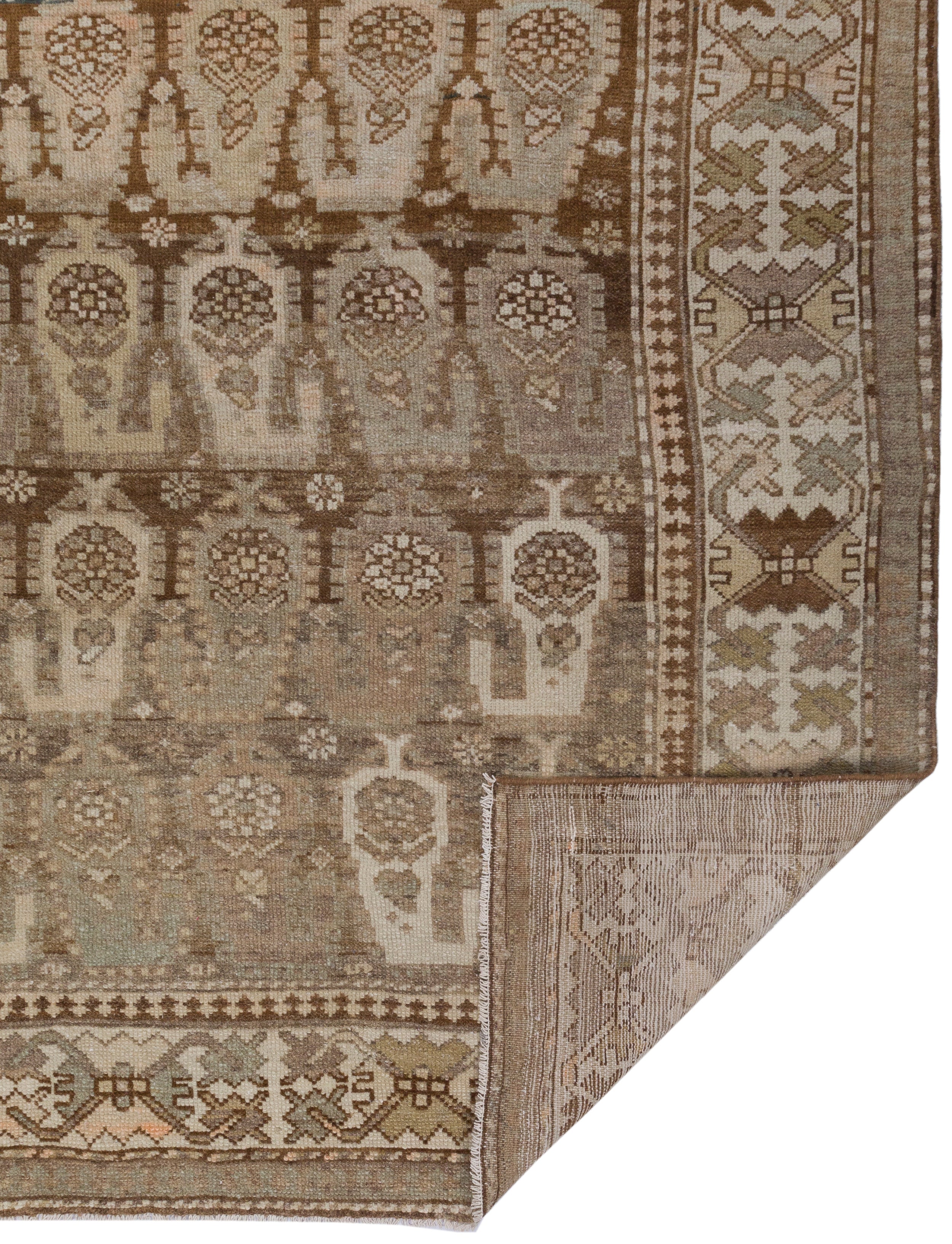 Antique Persian Rug with Paisley Boteh Motif in Earth Tones and Faded Indigo