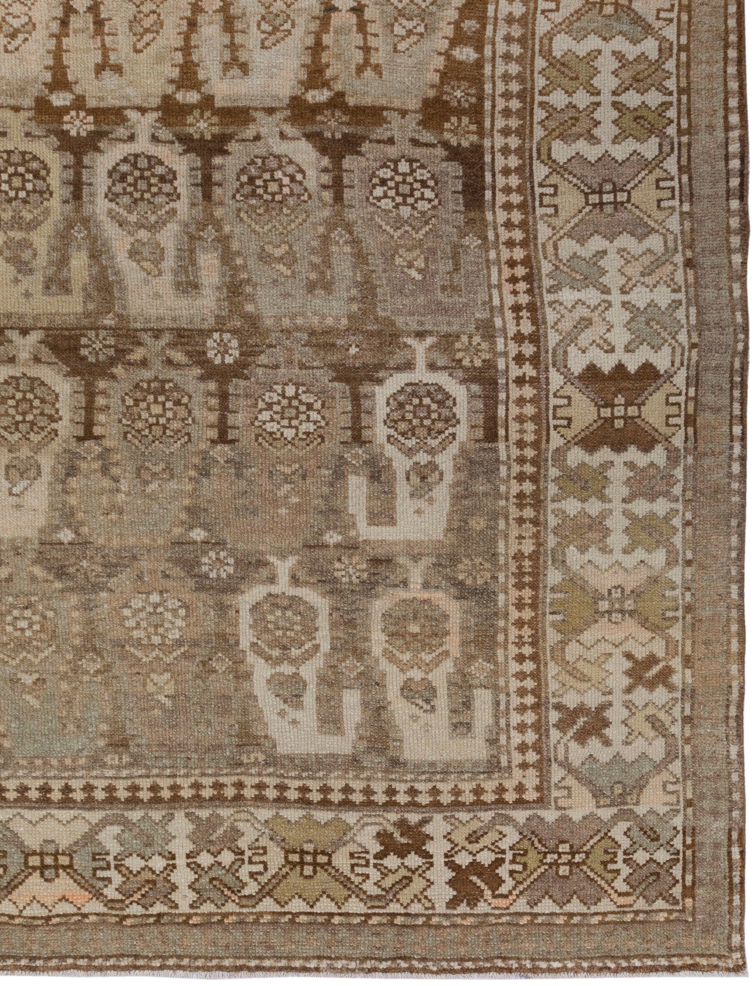 Antique Persian Rug with Paisley Boteh Motif in Earth Tones and Faded Indigo
