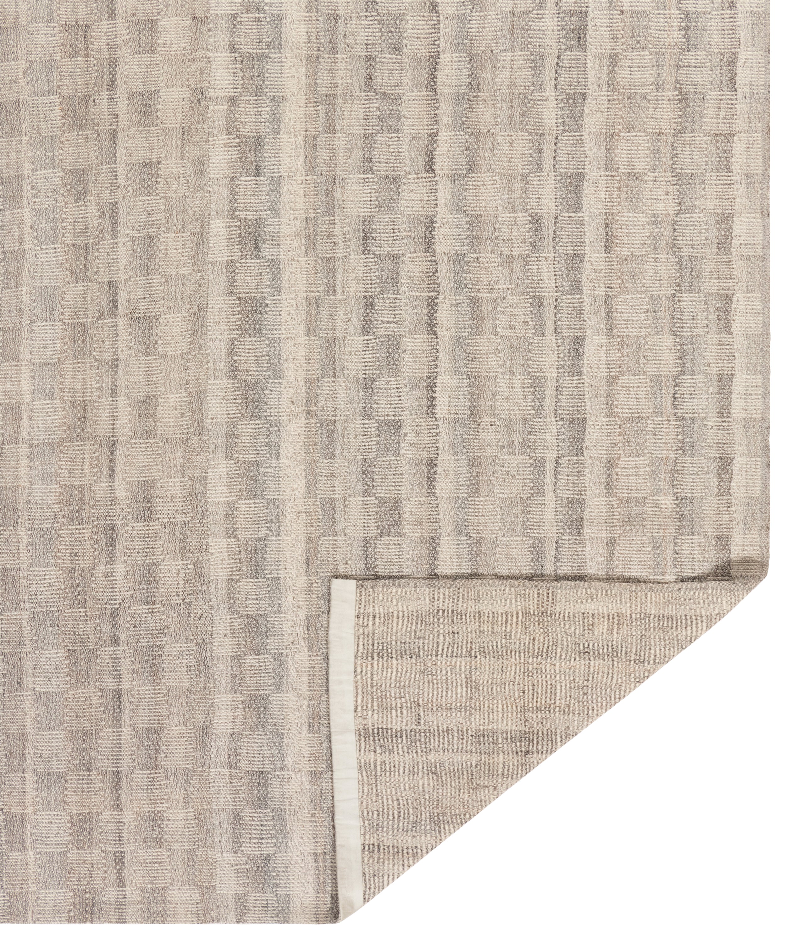 Handwoven Wool Rug in Warm Ivory with Subtle Woven Stripe Texture