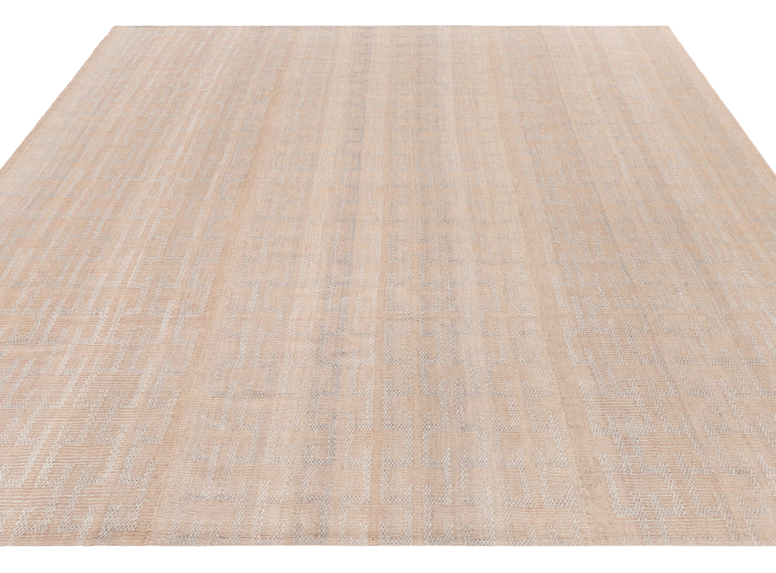 Handwoven Wool Rug in Blush Beige with Subtle Textural Weave