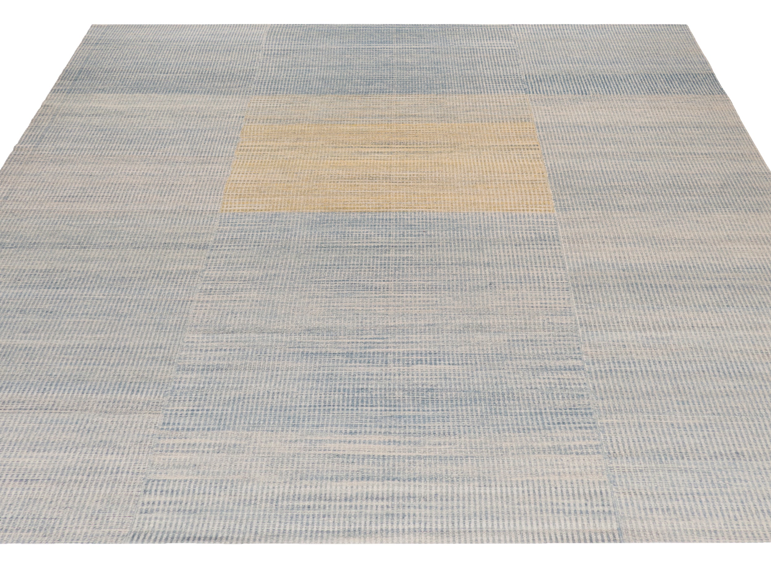 Handwoven Wool Rug in Blue and Sand with Minimalist Centered Square Design