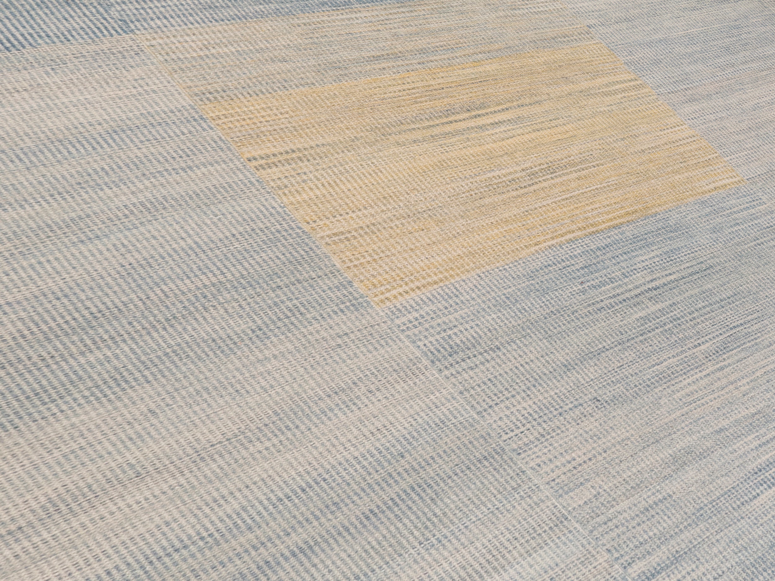 Handwoven Wool Rug in Blue and Sand with Minimalist Centered Square Design
